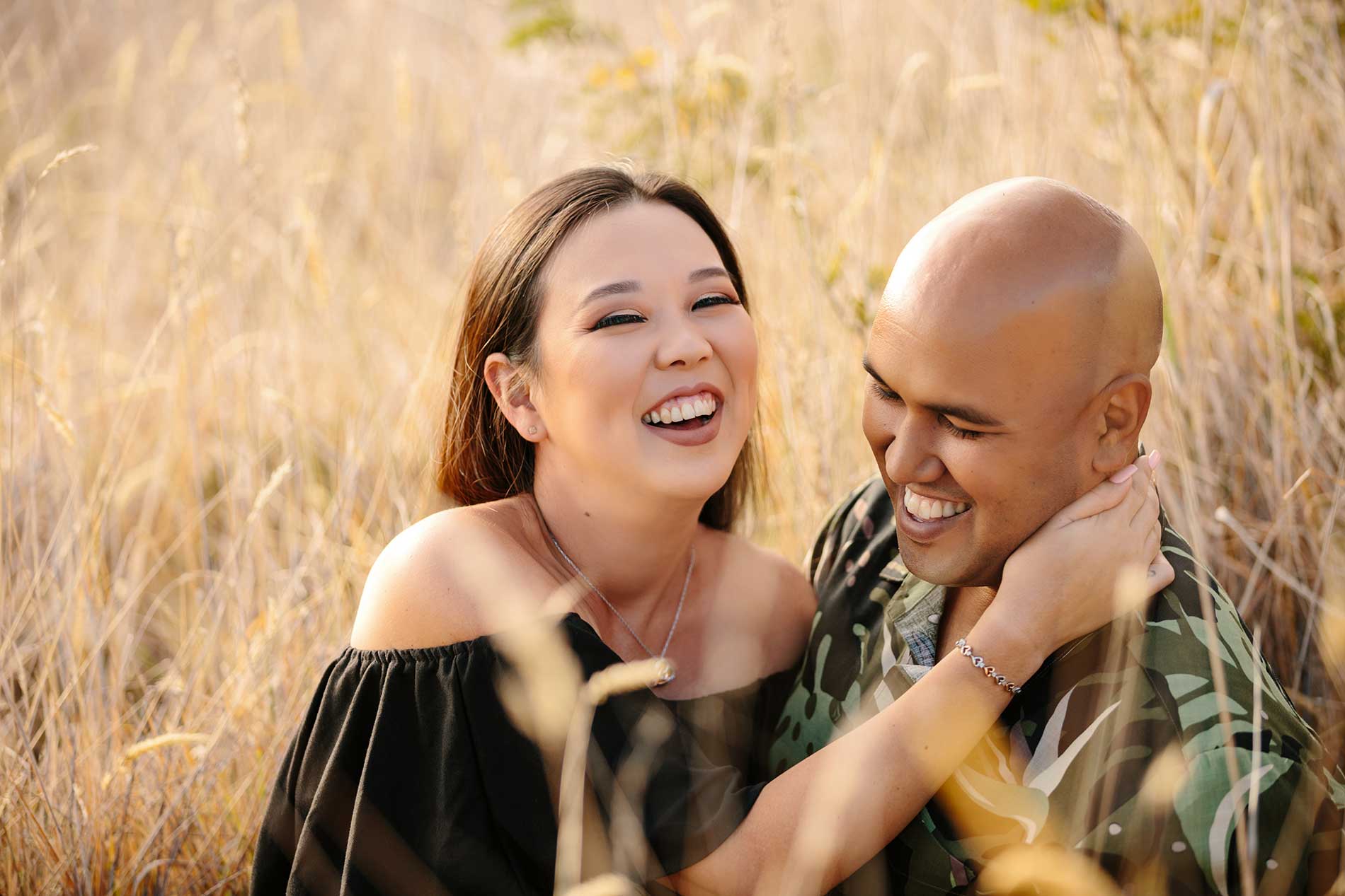 image of couple in the grass