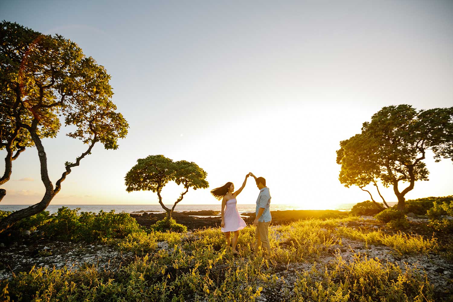 image of couple dancing in the grass