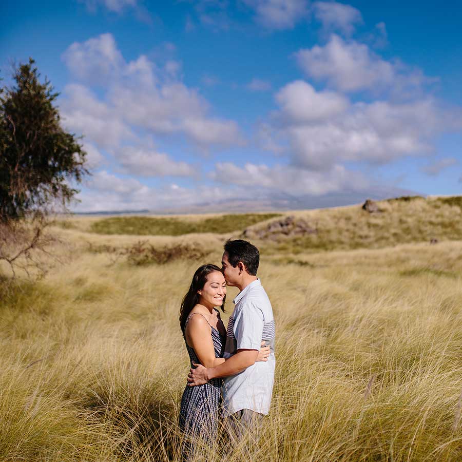 image of couple together in the grass