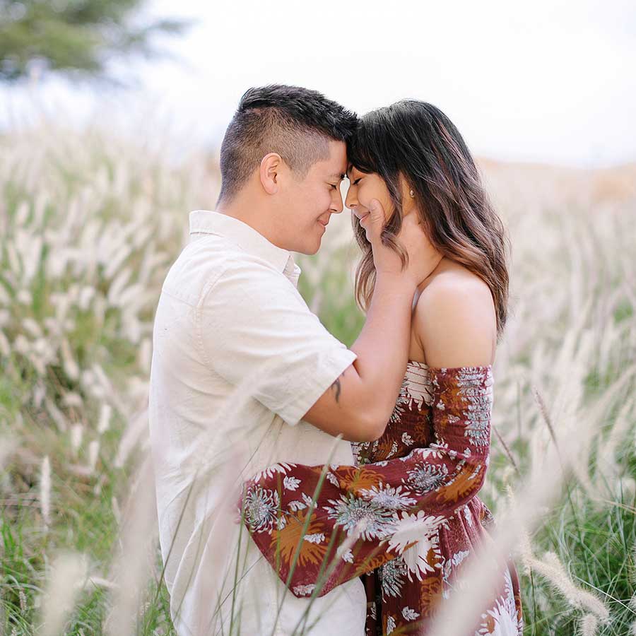 image of couple together in teh grass