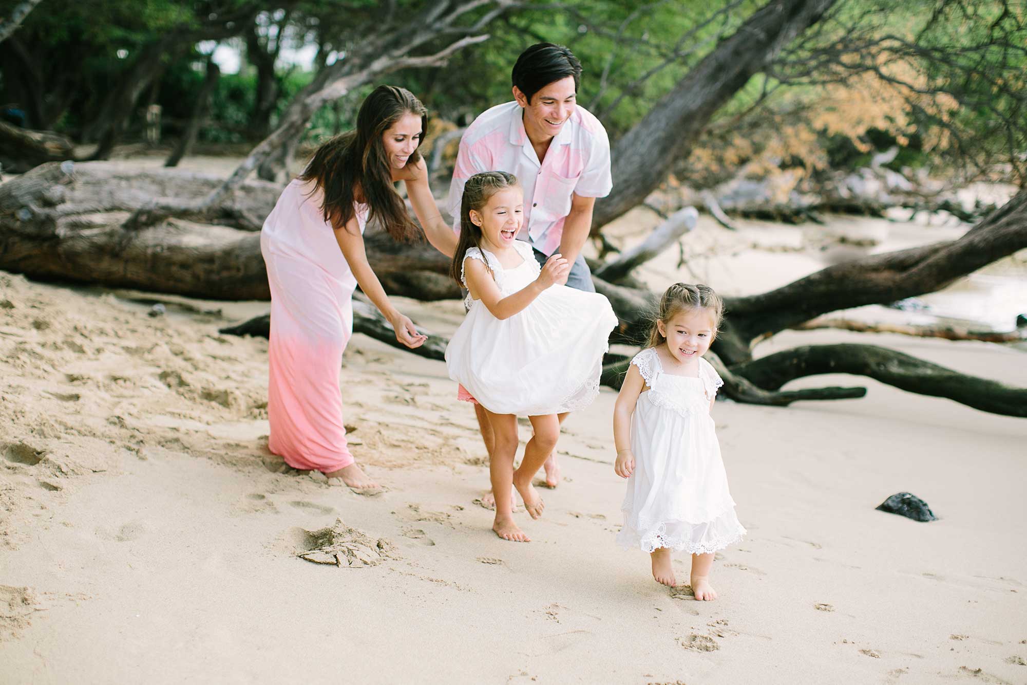 image of family together at the beach