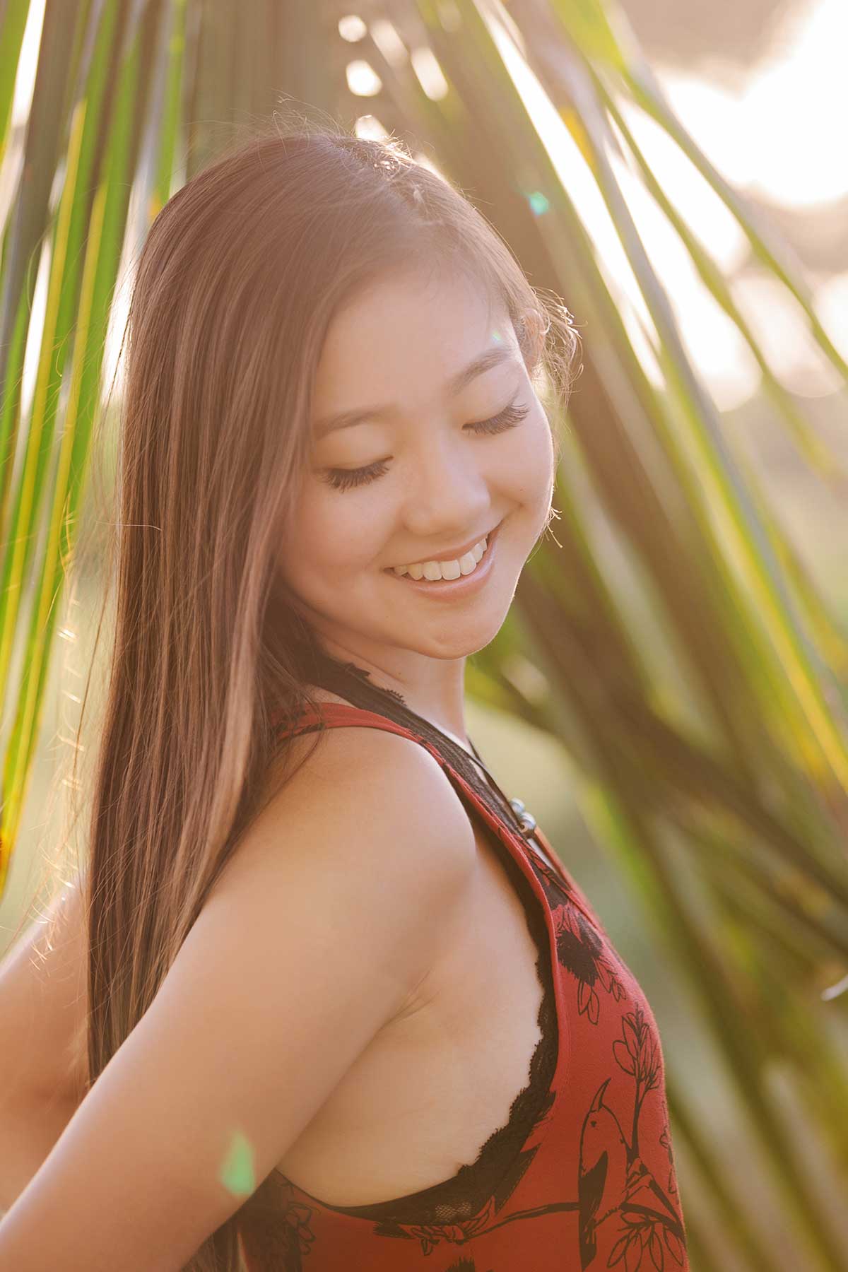 image of a senior portrait of a pretty girl near the beach