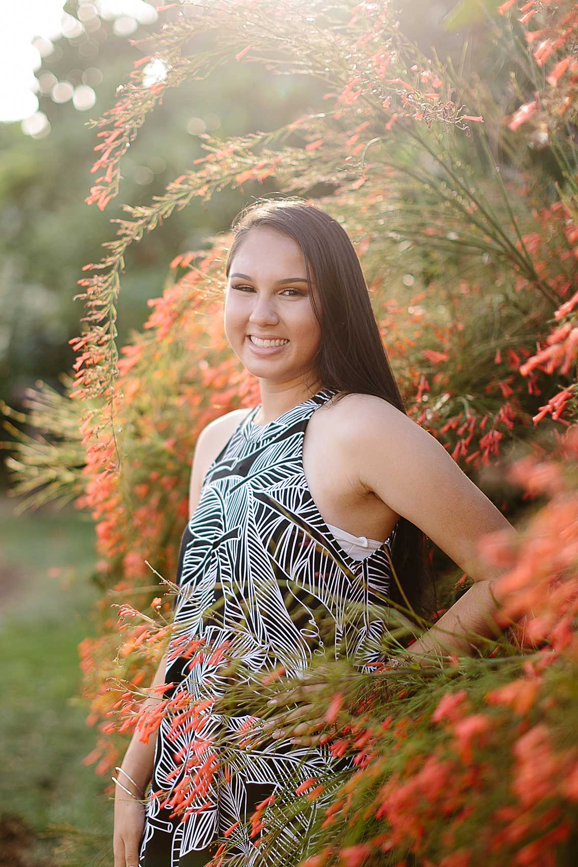 image of a senior portrait near flowers