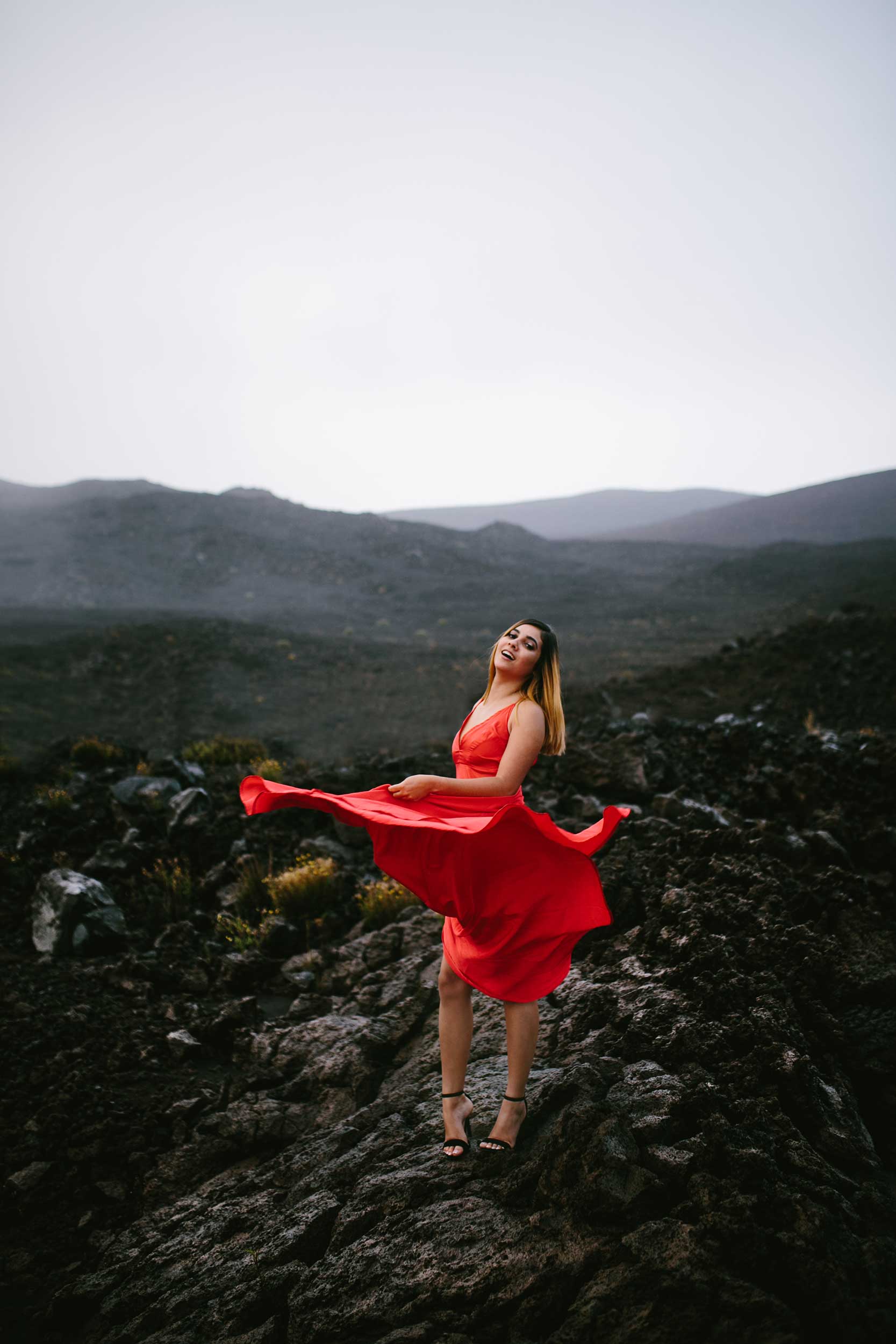 image of a senior portrait on lava rock