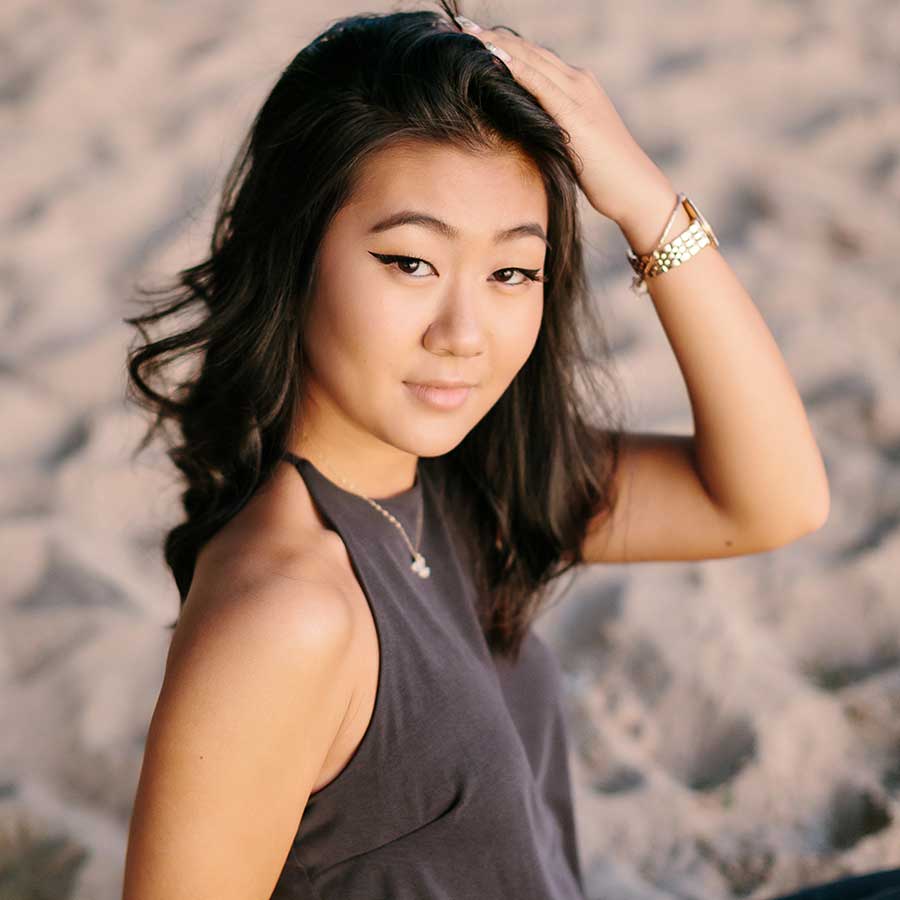 image of a senior portrait on the sand