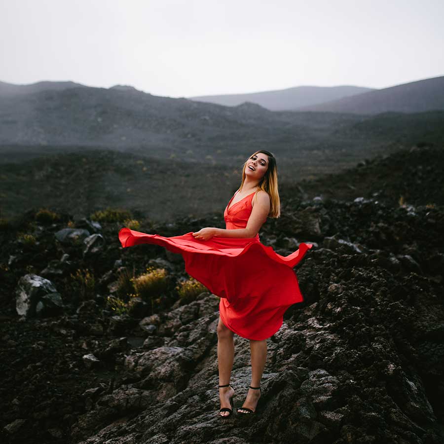 image of a senior portrait on lava rock