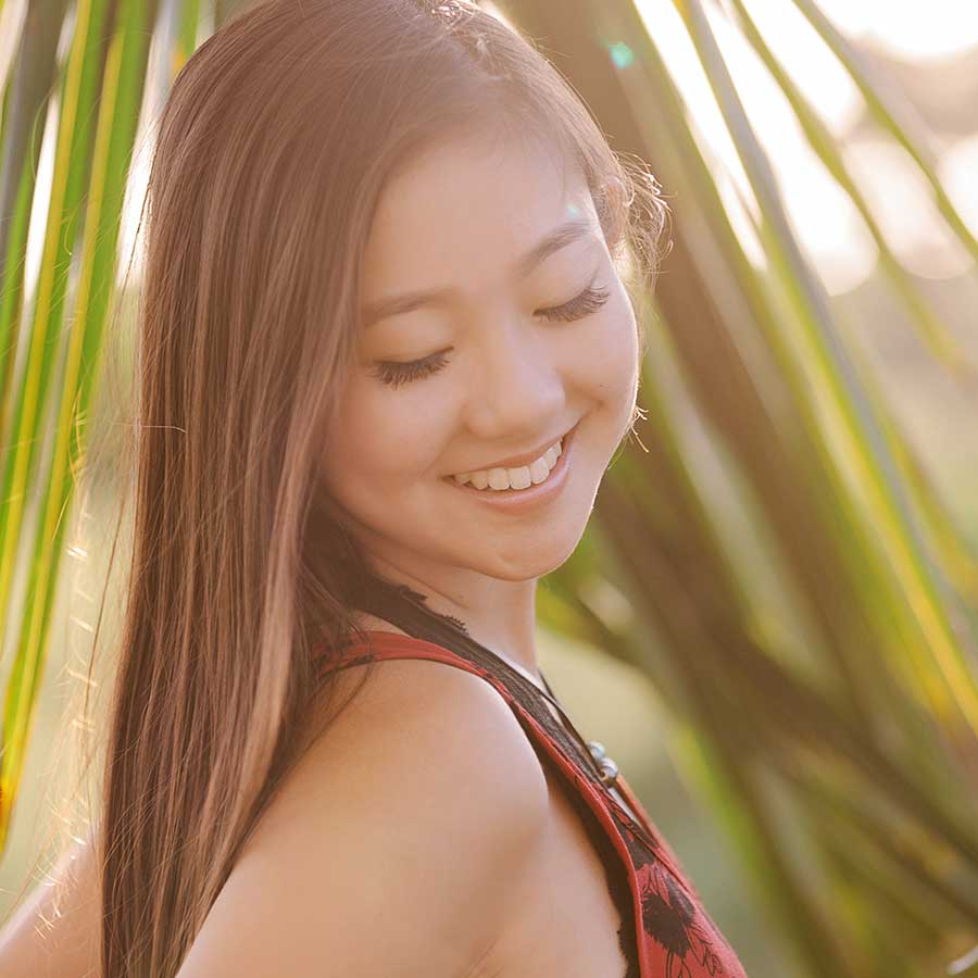 image of a senior portrait of a pretty girl near the beach