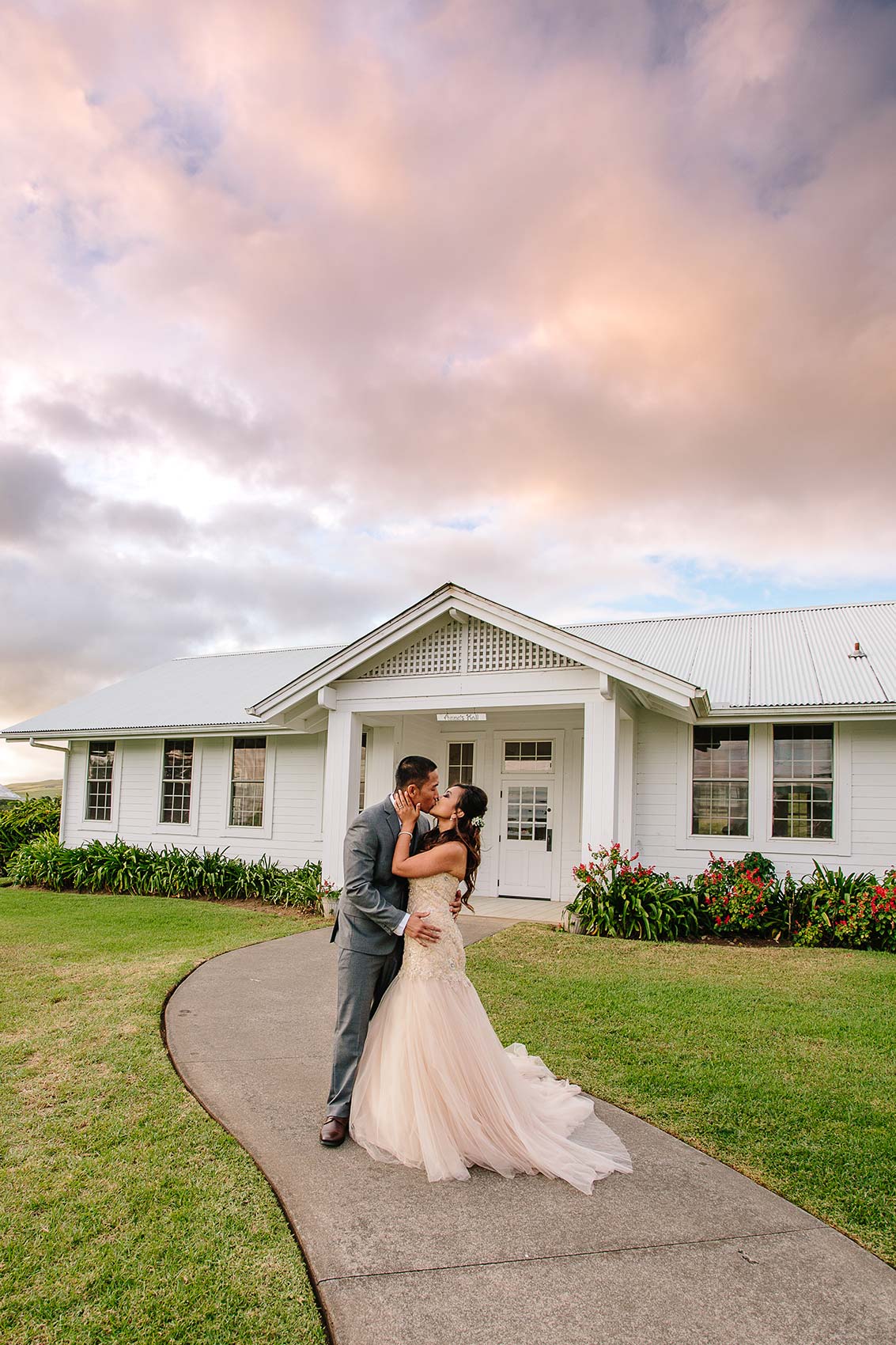 image of bridal couple outside church