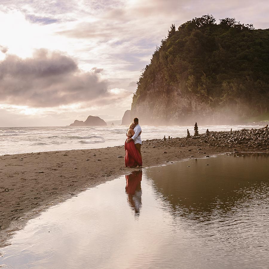 image of engaged couple on the beach