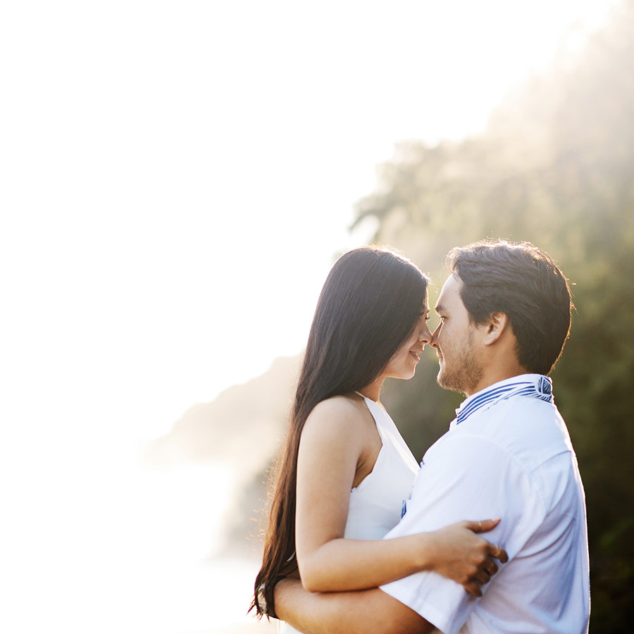 image of engaged couple at the beach