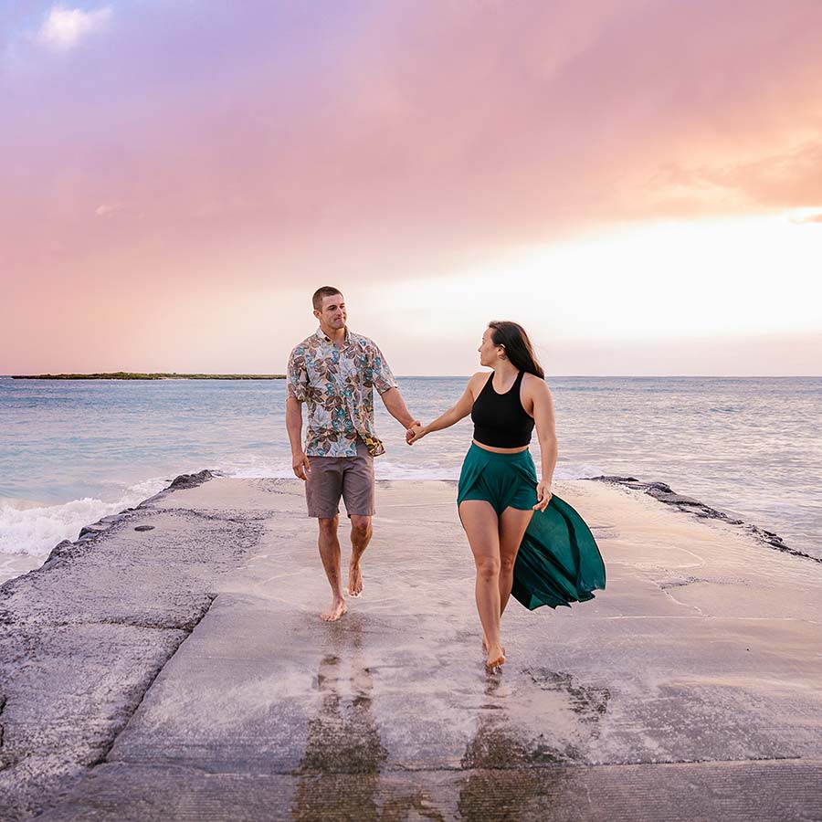 image of engaged couple at the beach