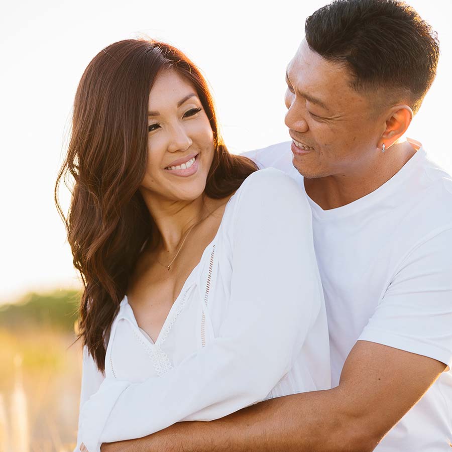 image of engaged couple at the beach