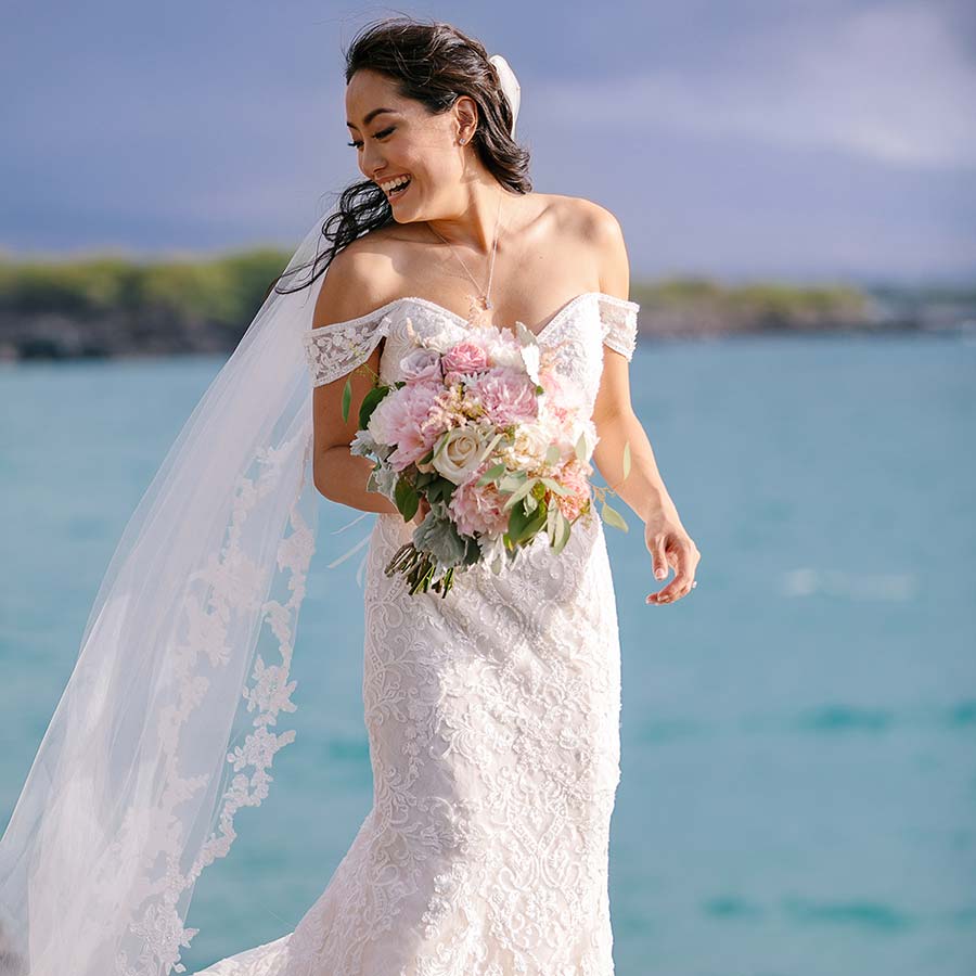 image of bride on the beach